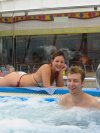 Leigth and Dave relax in one of the many hot tubs on the Carvival Conquest