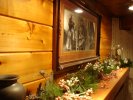 Fireplace mantle with appropiate photos of Annie Oakley